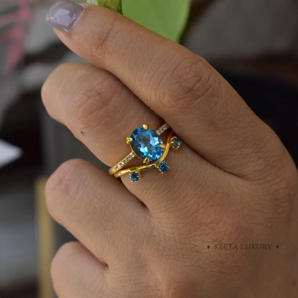 Oceanic Elegance - Blue Topaz Ring